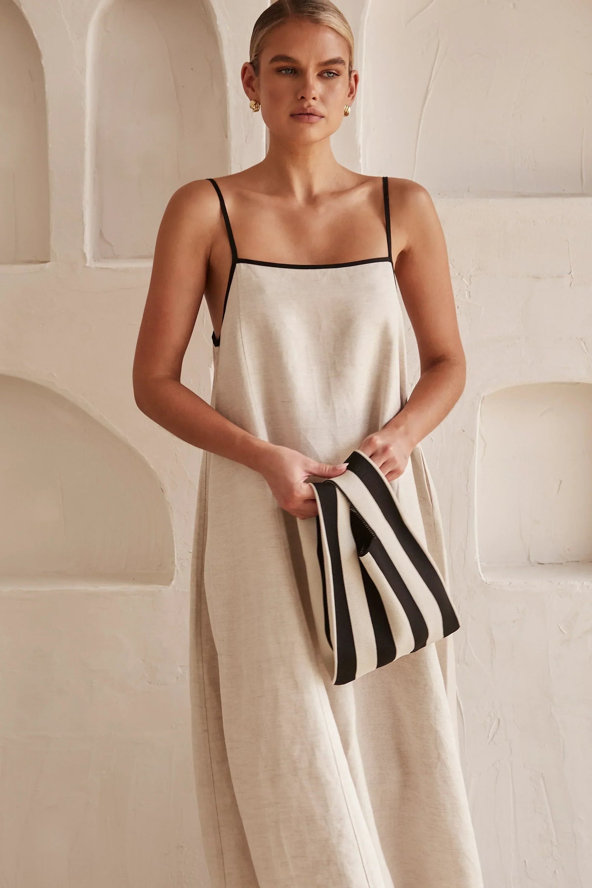 Floriana - Maxi Dress – beige with black trim – lifestyle (3)