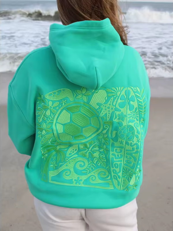 Novi - Oversized Hoodie with Sunset Jungle Vibes