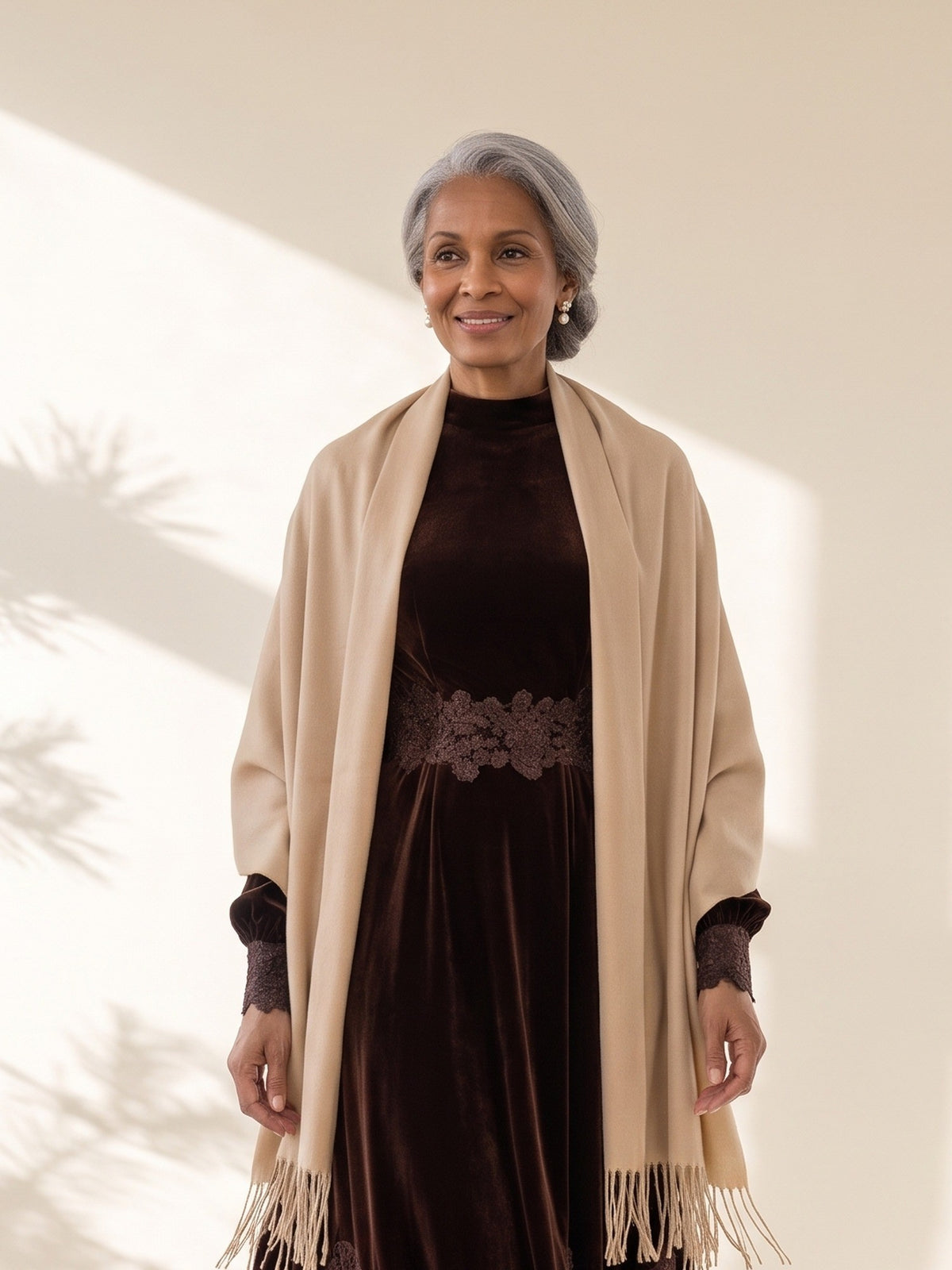 Blythe Evening Wrap in Camel, worn over the shoulders