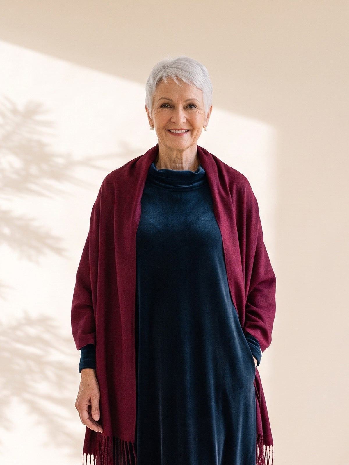 Blythe Evening Wrap in Burgundy, worn over the shoulders