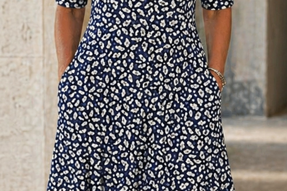 Linnea Pocket Midi Dress — side seam pockets in use