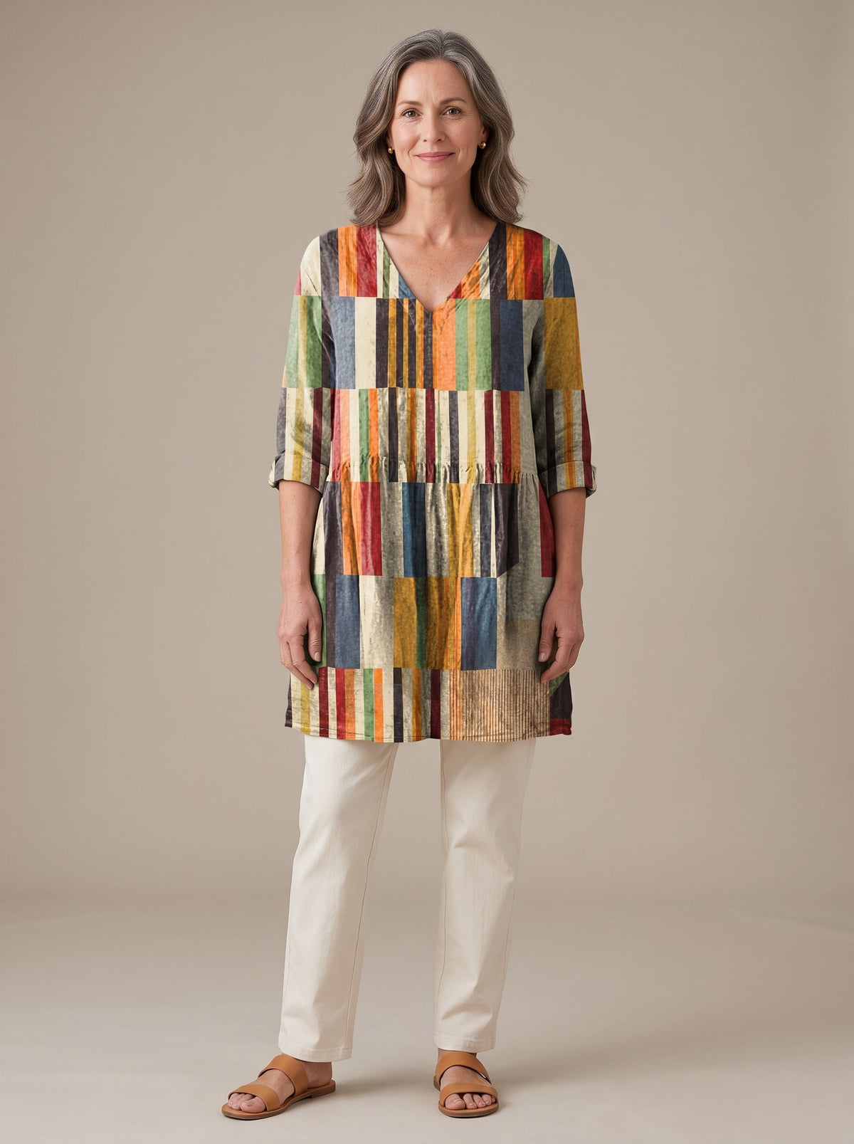 Verbena Tunic Blouse — full length, styled with cream trousers