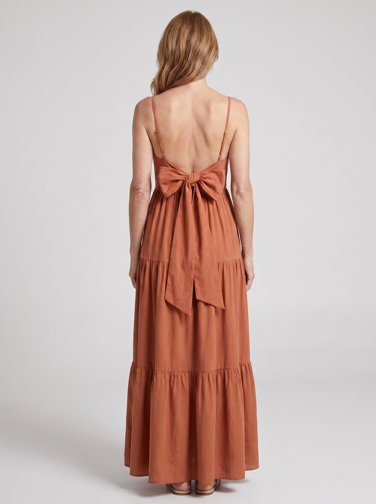 Colette tiered bow-back maxi dress in Terracotta - back view