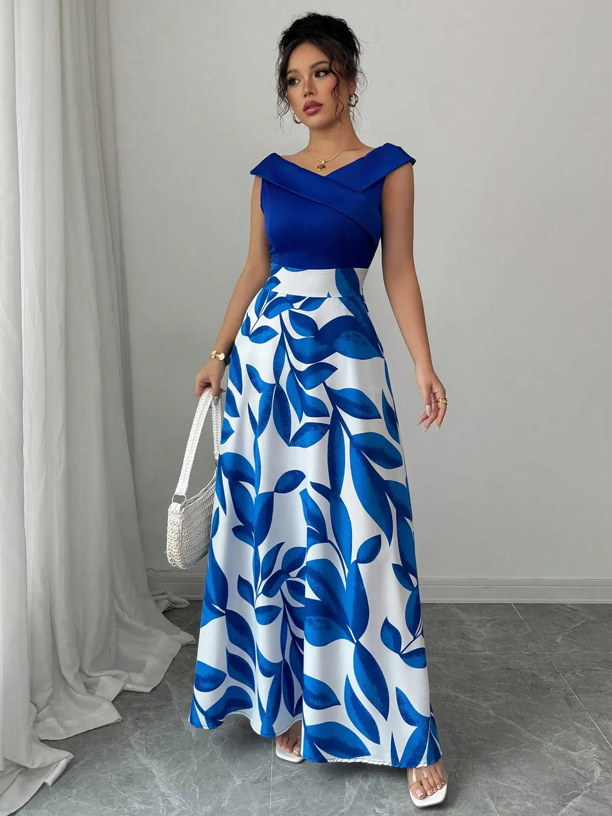 Hilary Maxi Dress in Blue Cap Sleeve, three-quarter view